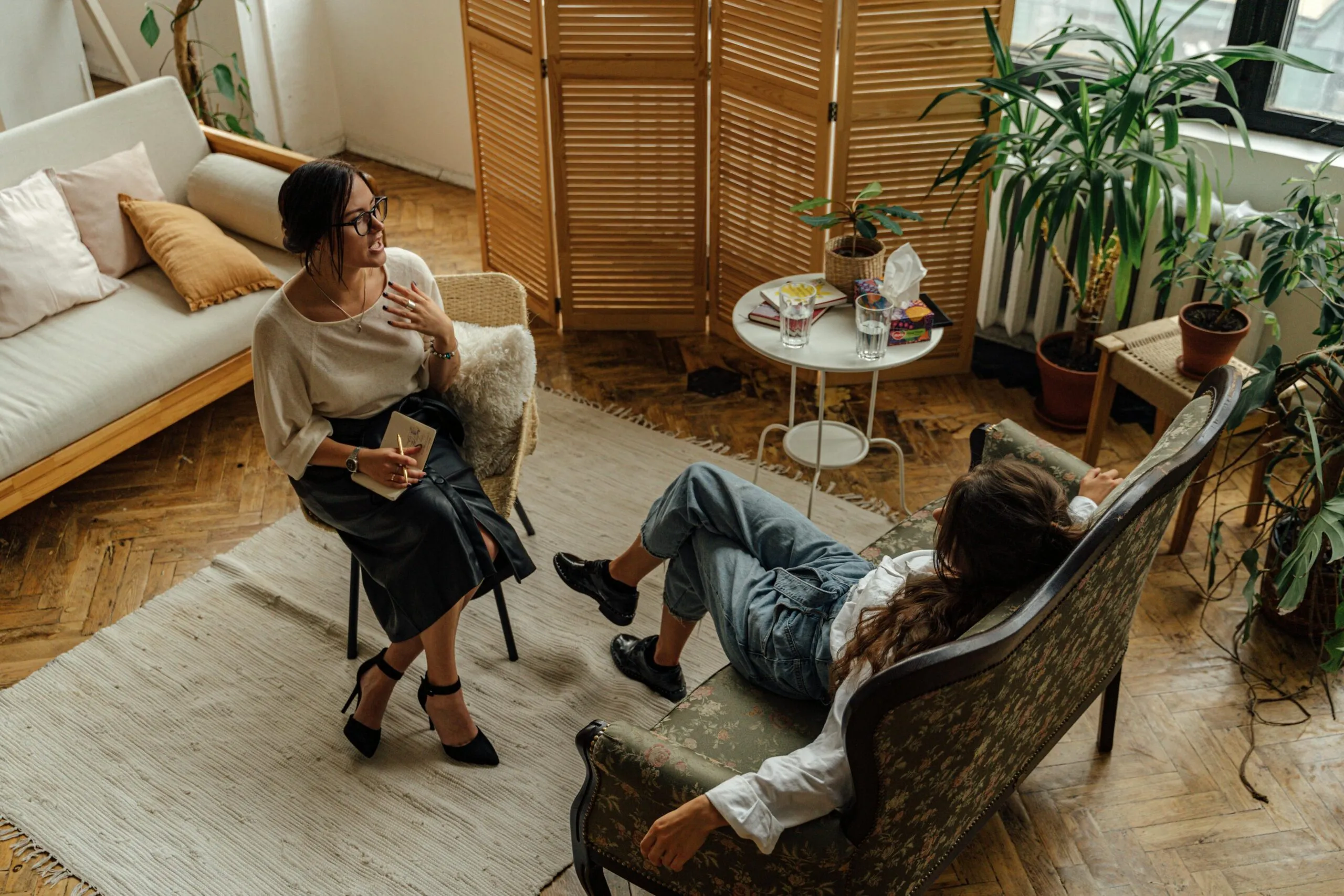 Two women in a therapy session representing the EMDR therapy process for healing trauma and negative beliefs