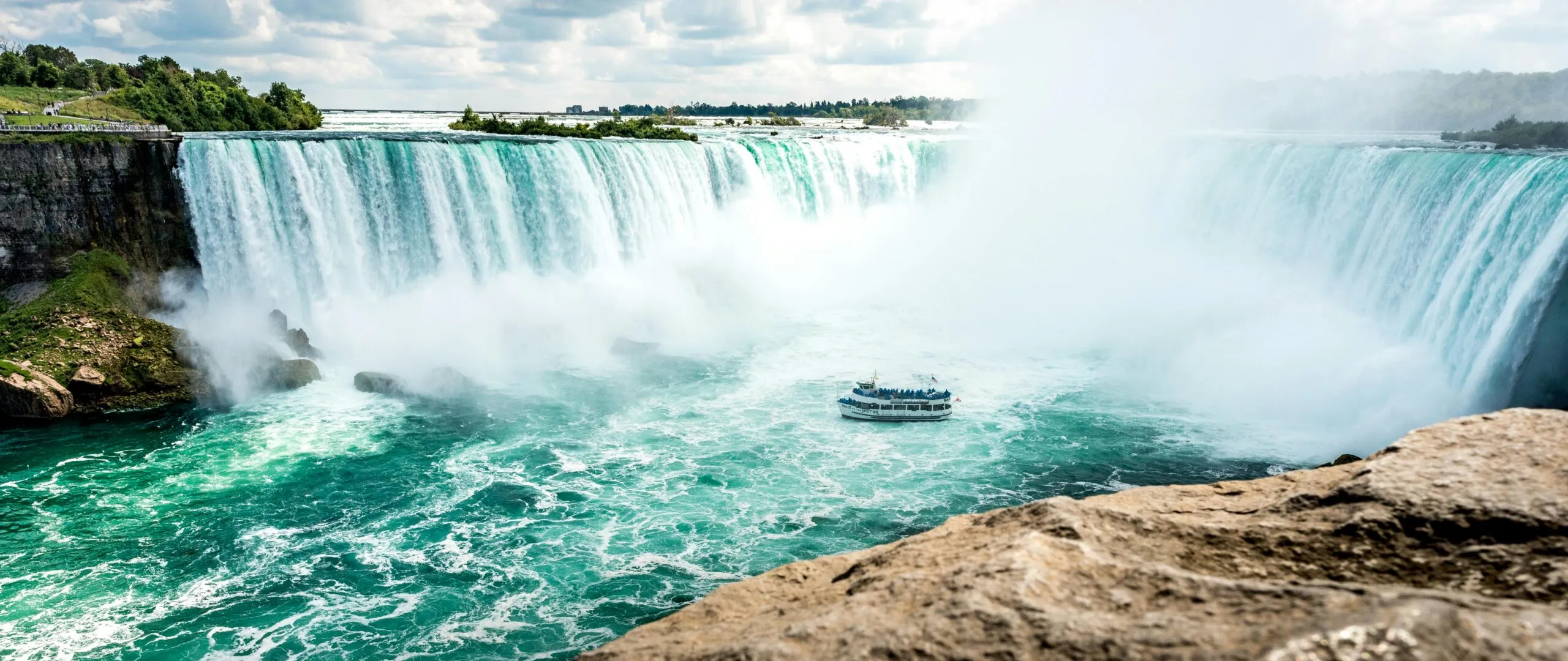 Niagara Falls mist and rushing water representing the upstream battle of rebuilding trust after betrayal trauma