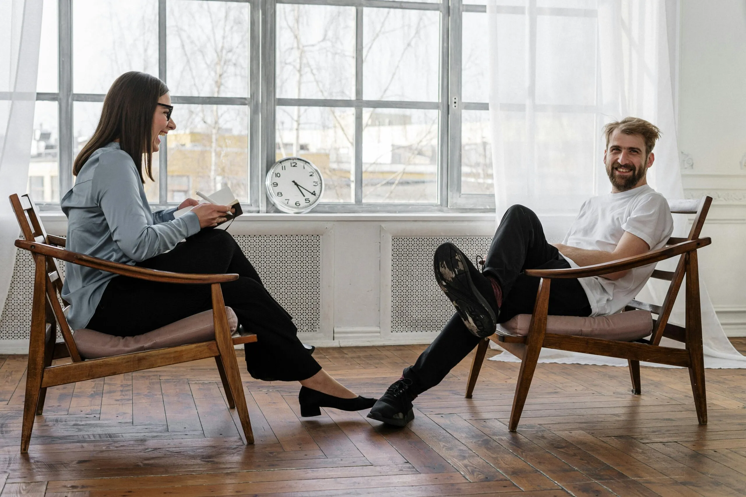 Therapist and client in a positive counseling session representing the role of the therapist at Big Valley Therapy in Sandy Utah