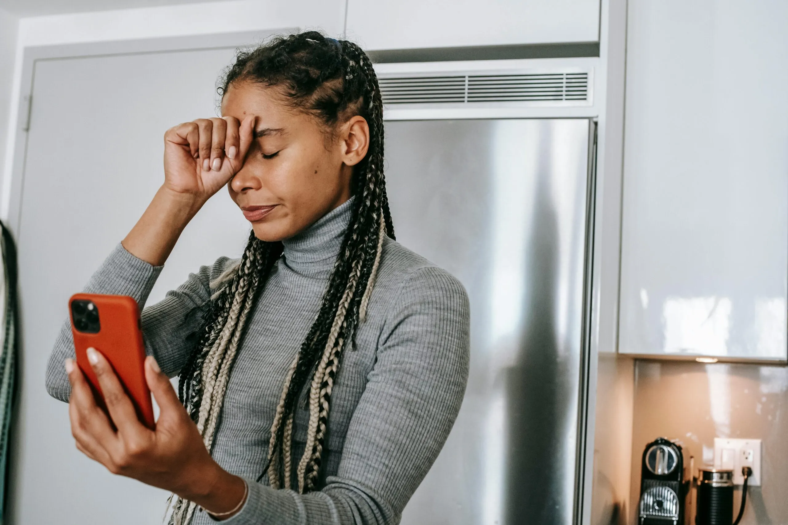 Woman having an emotional conversation on her smartphone representing misread texts and communication challenges in relationships