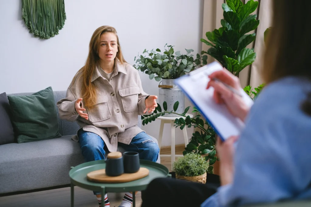 Woman in individual therapy session discussing betrayal trauma with a therapist in Salt Lake Valley