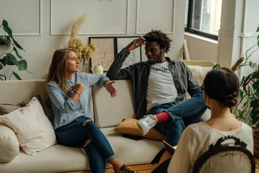 Couple engaged in a couples therapy session after betrayal trauma in Utah