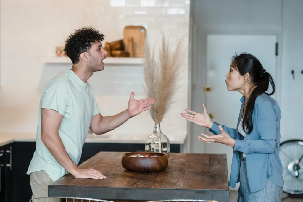 Couple having a difficult conversation during relationship conflict — couples therapy Utah