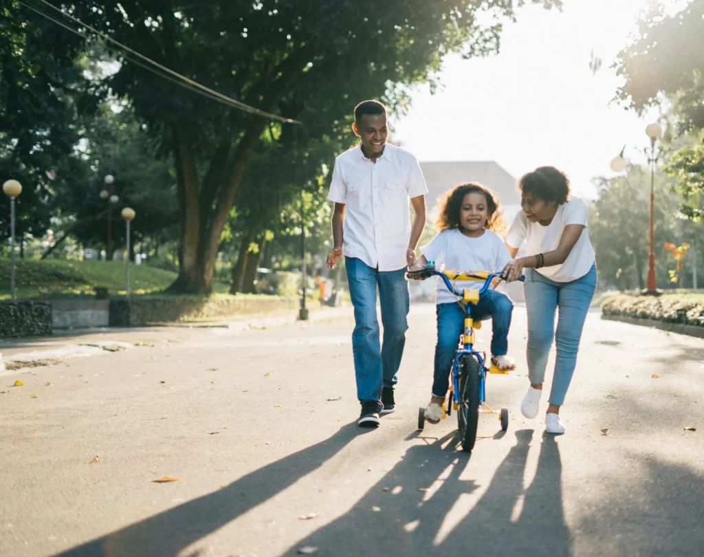 Family outdoors representing emotional connection and healing through IFS therapy in Utah