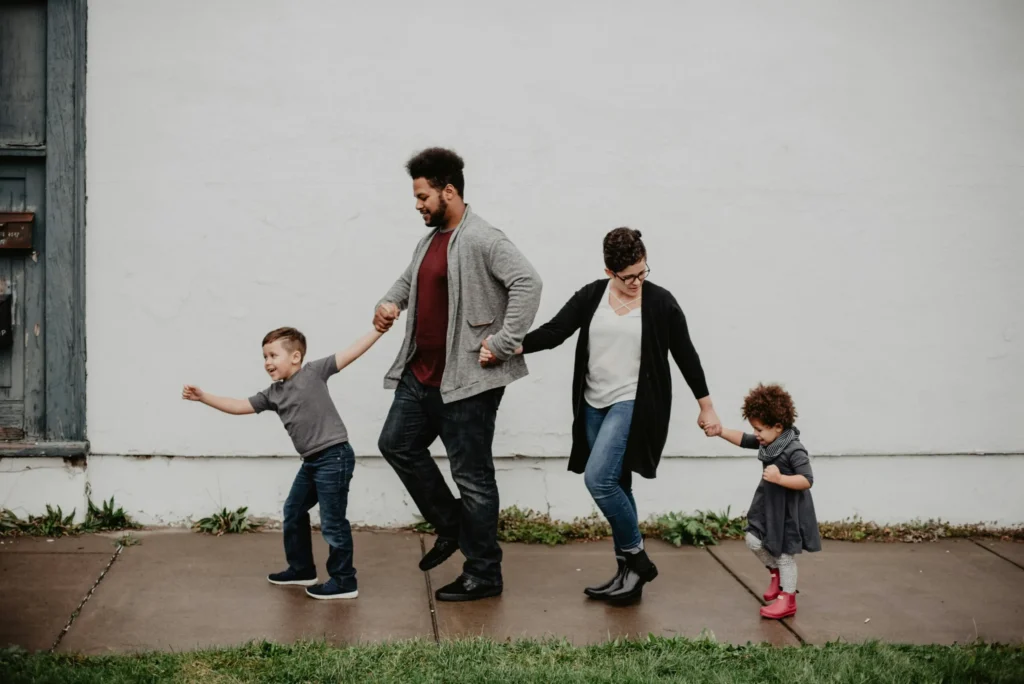 Family outdoors representing emotional connection and healing through IFS therapy in Utah