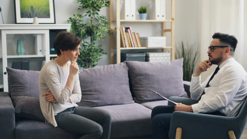 Therapist speaking with client during individual therapy session in Sandy Utah